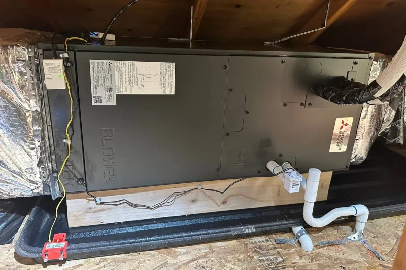 Air handler suspended in a crawl space