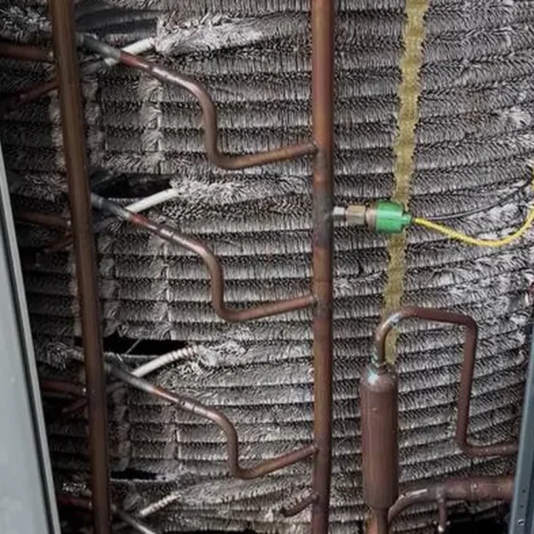 Condenser coil opened for cleaning and service