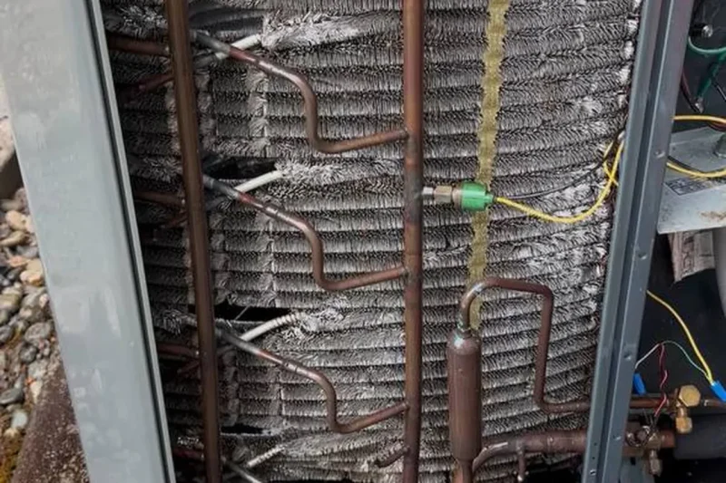 Condenser coil opened for cleaning and service