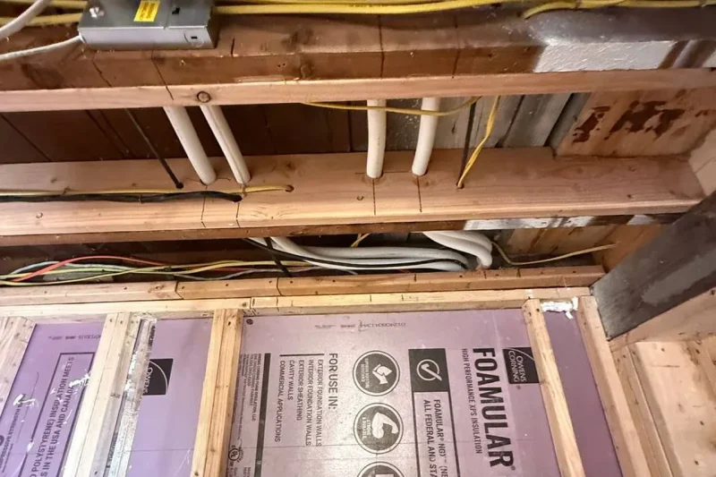 Crawl space piping and insulation during an installation