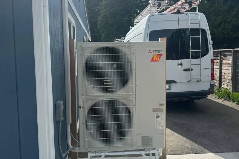 EverHeat Solutions van beside a newly installed multi-zone heat pump