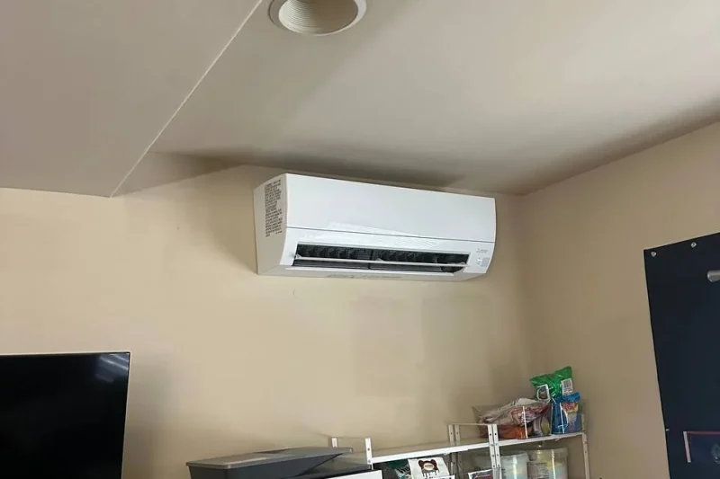 Ductless mini-split indoor head installed in a family room