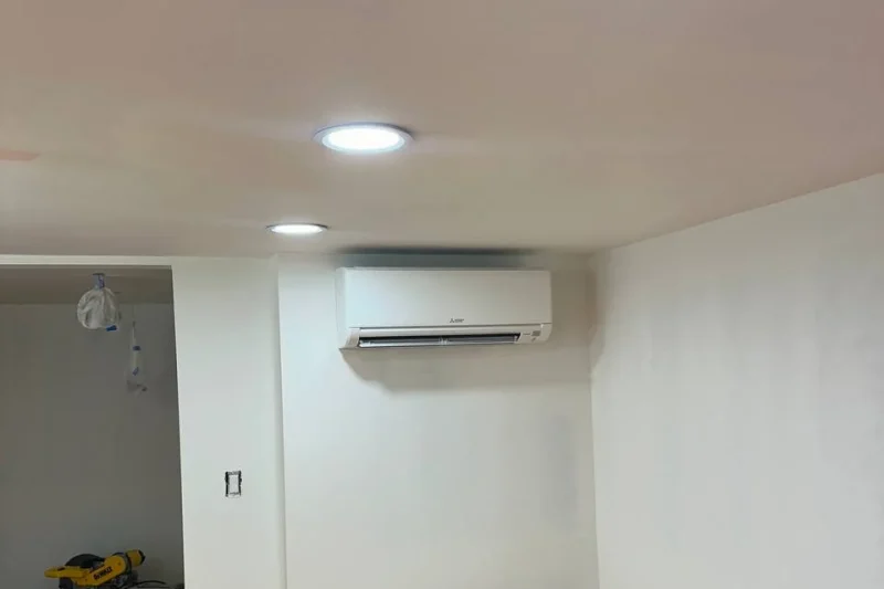 Ductless mini-split indoor head installed in a finished basement