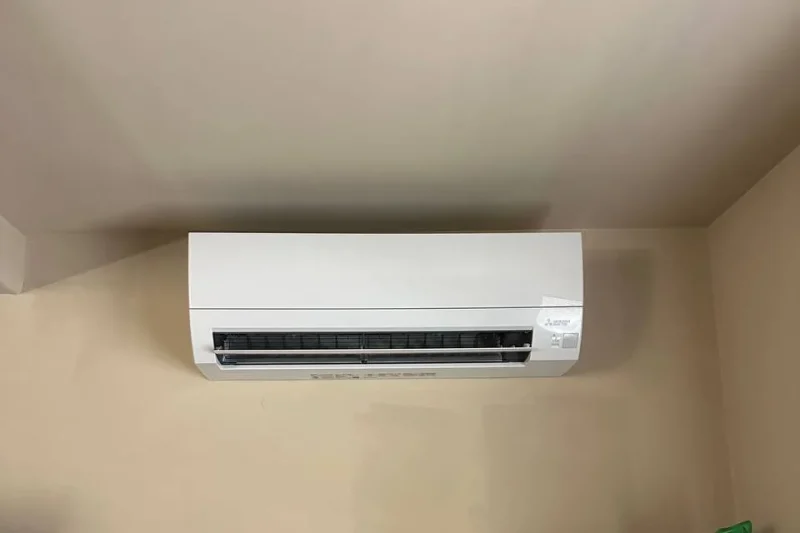 Ductless mini-split indoor head installed in a home office