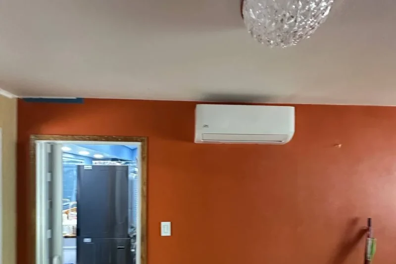 Ductless mini-split indoor head installed in a living room