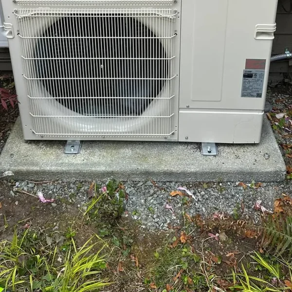Mitsubishi Electric multi-zone heat pump installed beside a home